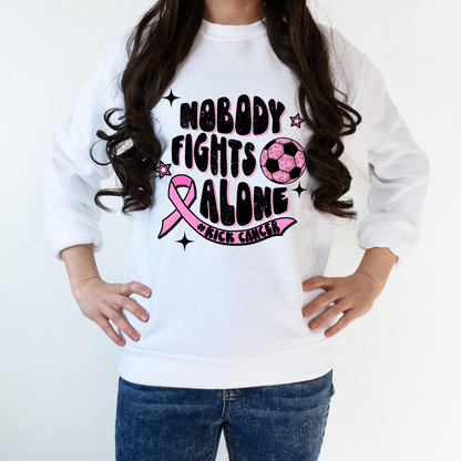 Nobody fights along Breast Cancer Awareness soccer